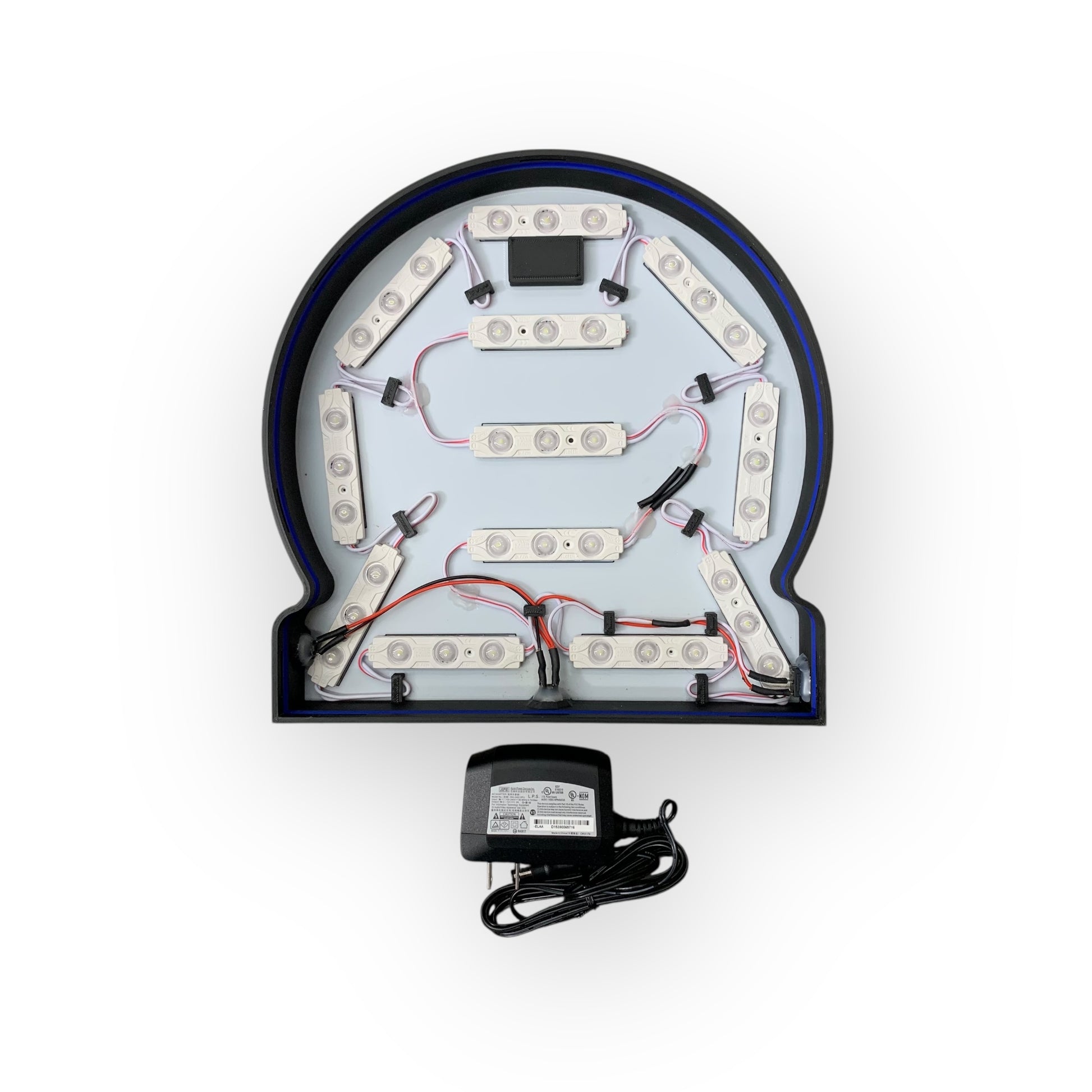 Inside of led indoor sign with a power supply on a white background