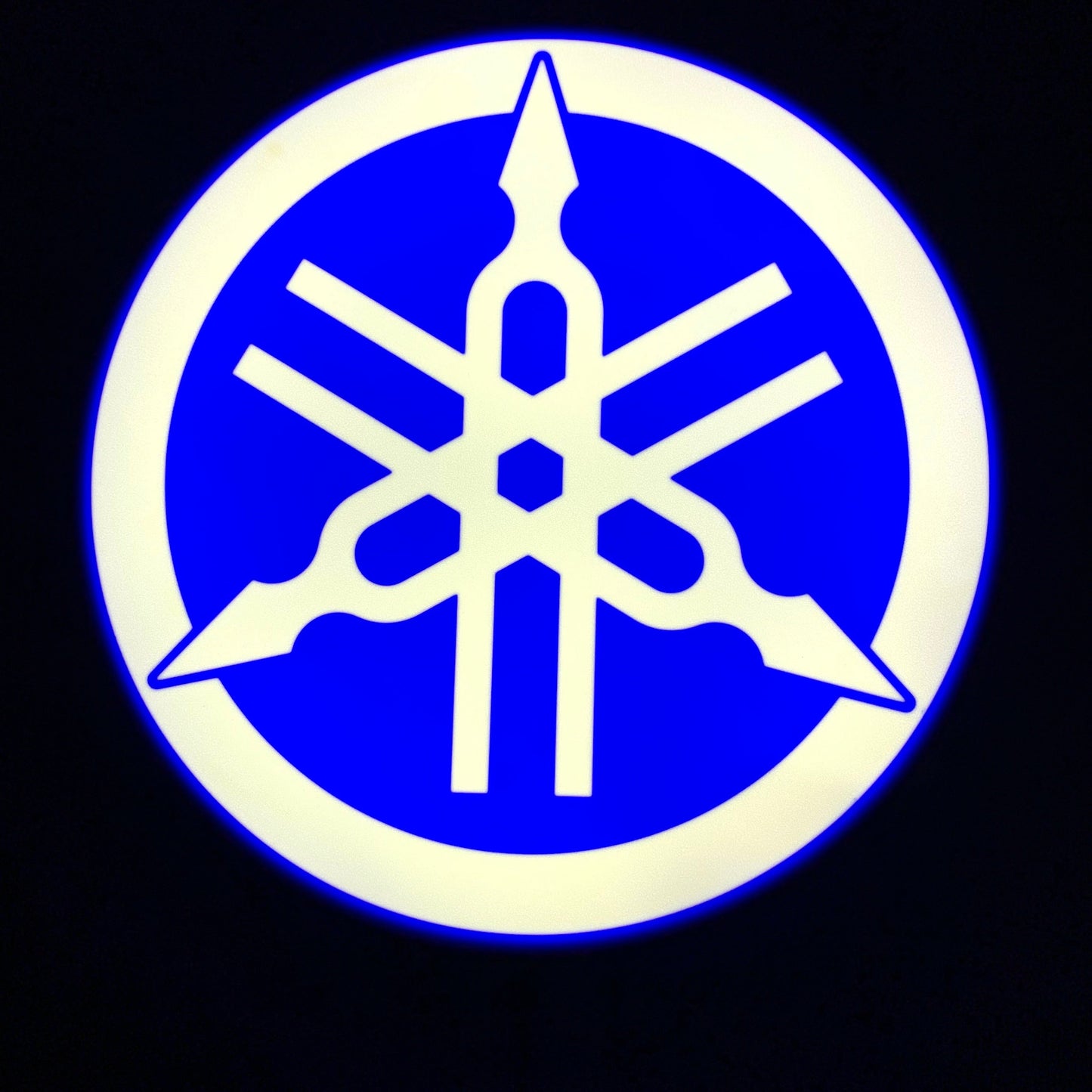 Yamaha logo with blue background on led indoor sign lit up