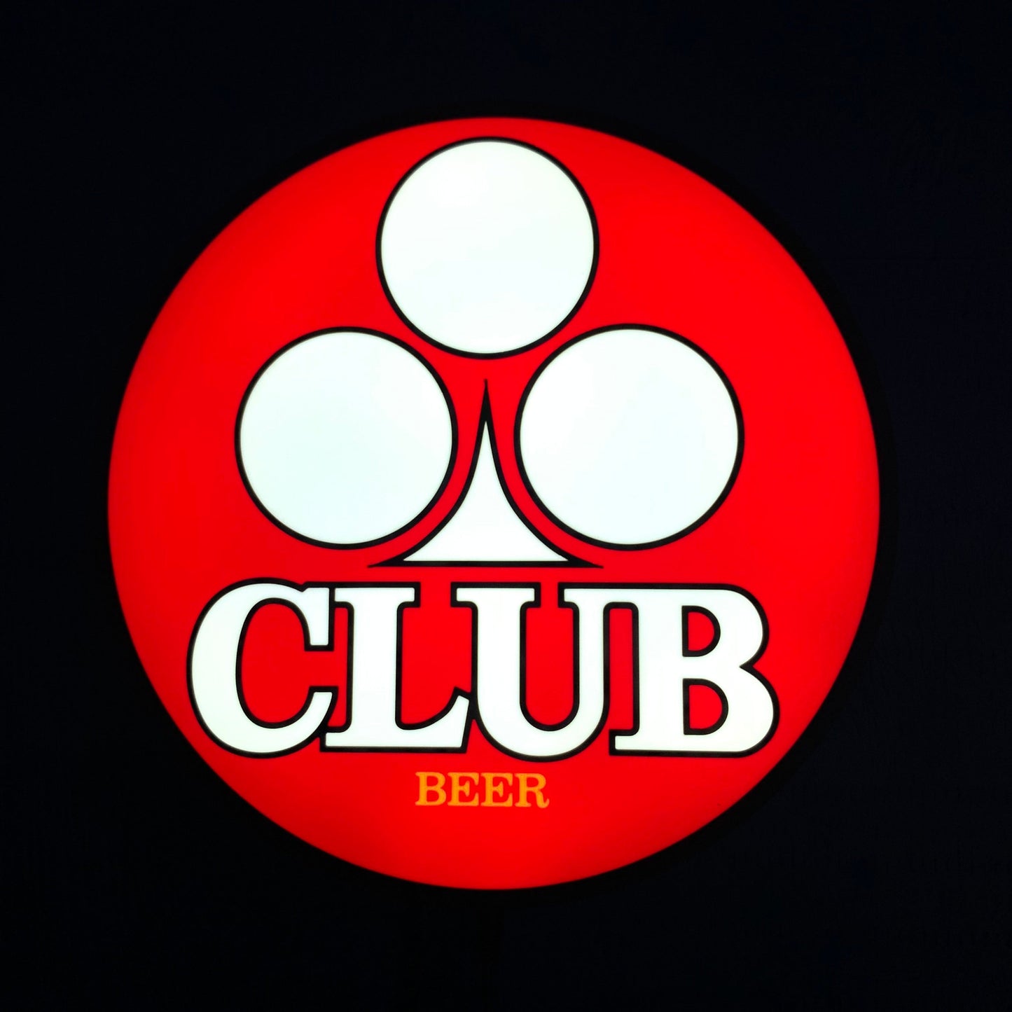 Red circle with white logo and 'CLUB BEER' text on a black background on a led indoor sign lit up