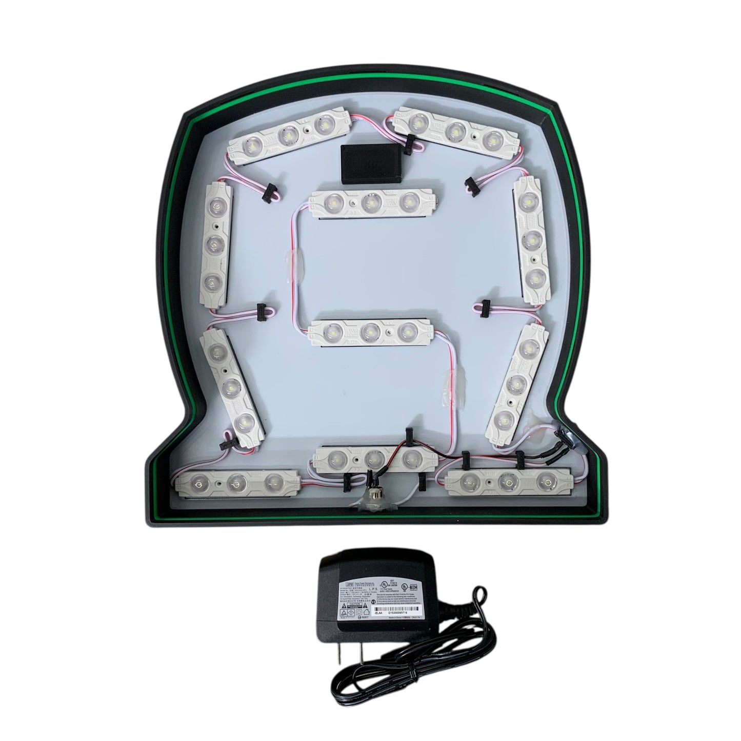 LED sign component with wiring and power supply on a white background