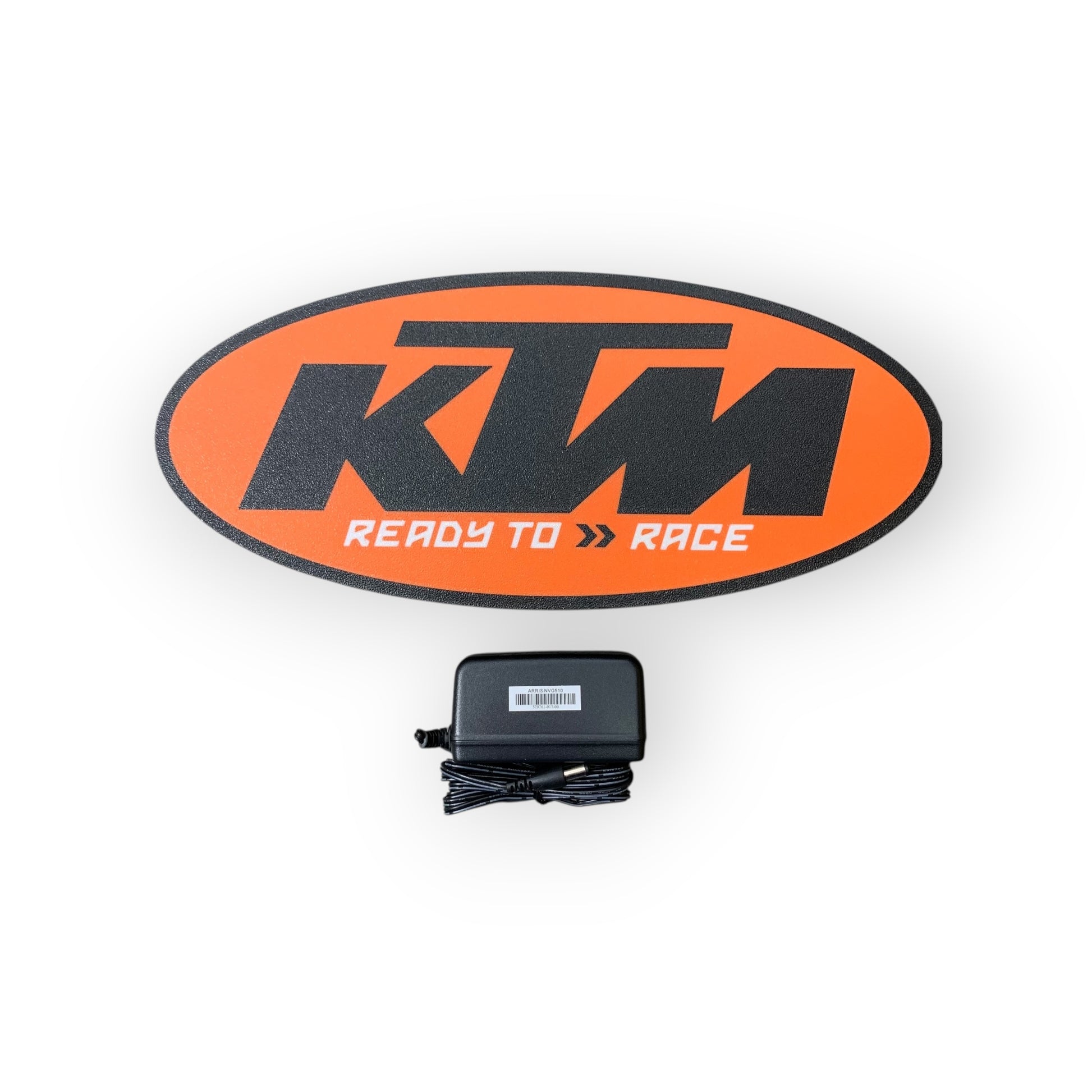 KTM led sign with 'Ready to Race' text and a power adapter on a white background