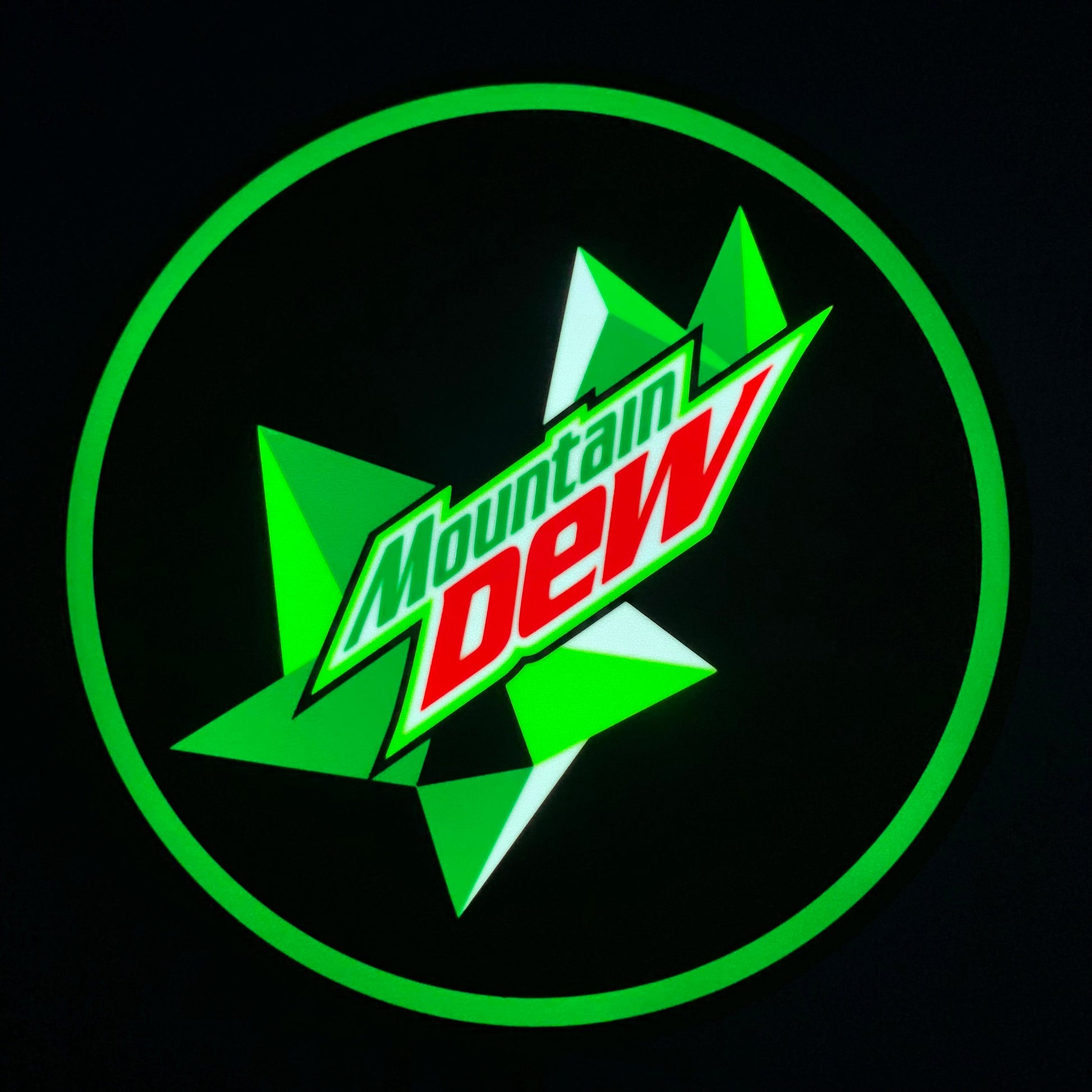 Mountain Dew led indoor sign with green and red colors on a black background