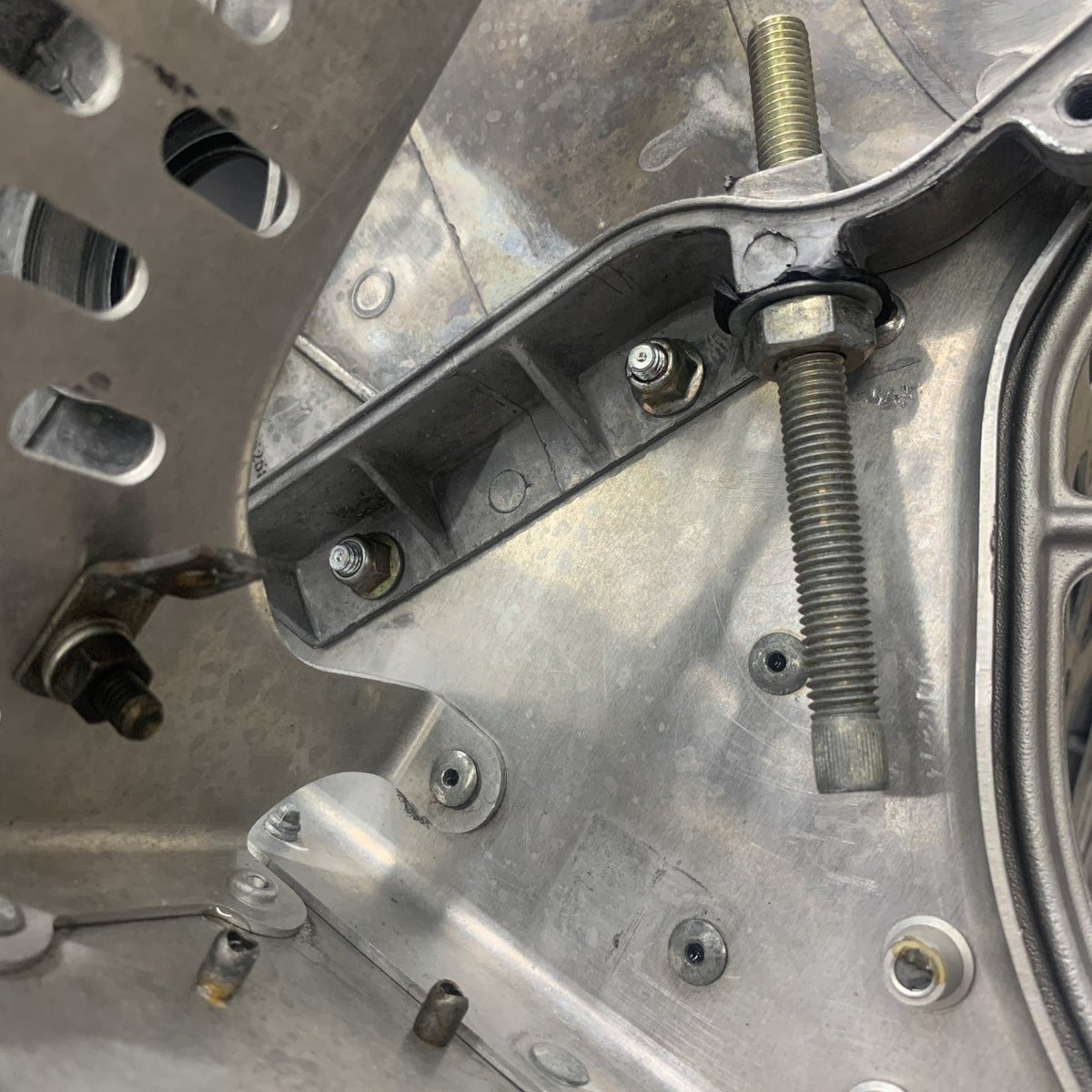 Ski-Doo XP Chain Case Mounting Plate 518325816 installed front side view