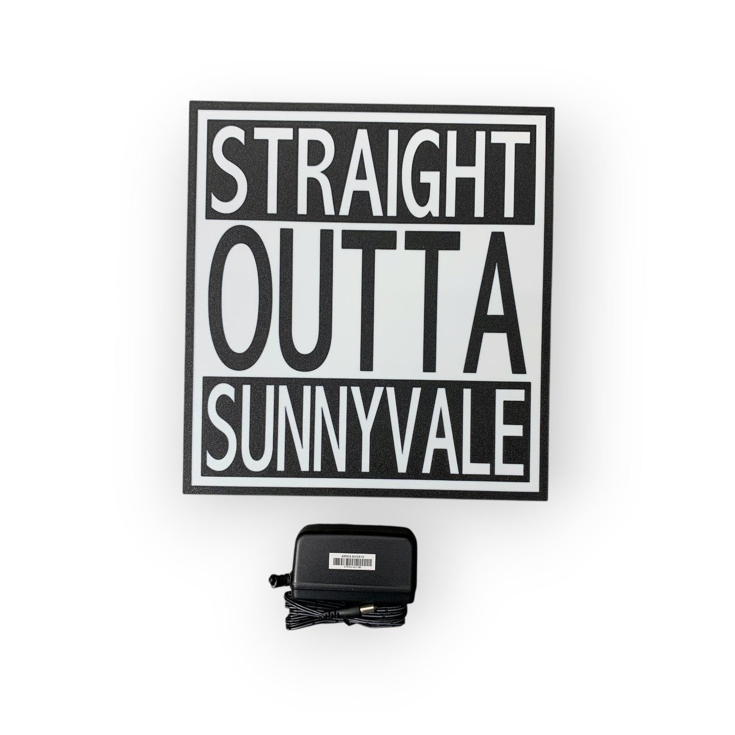 Decorative led indoor sign with 'Straight Outta Sunnyvale' text on a white background, accompanied by a power adapter.