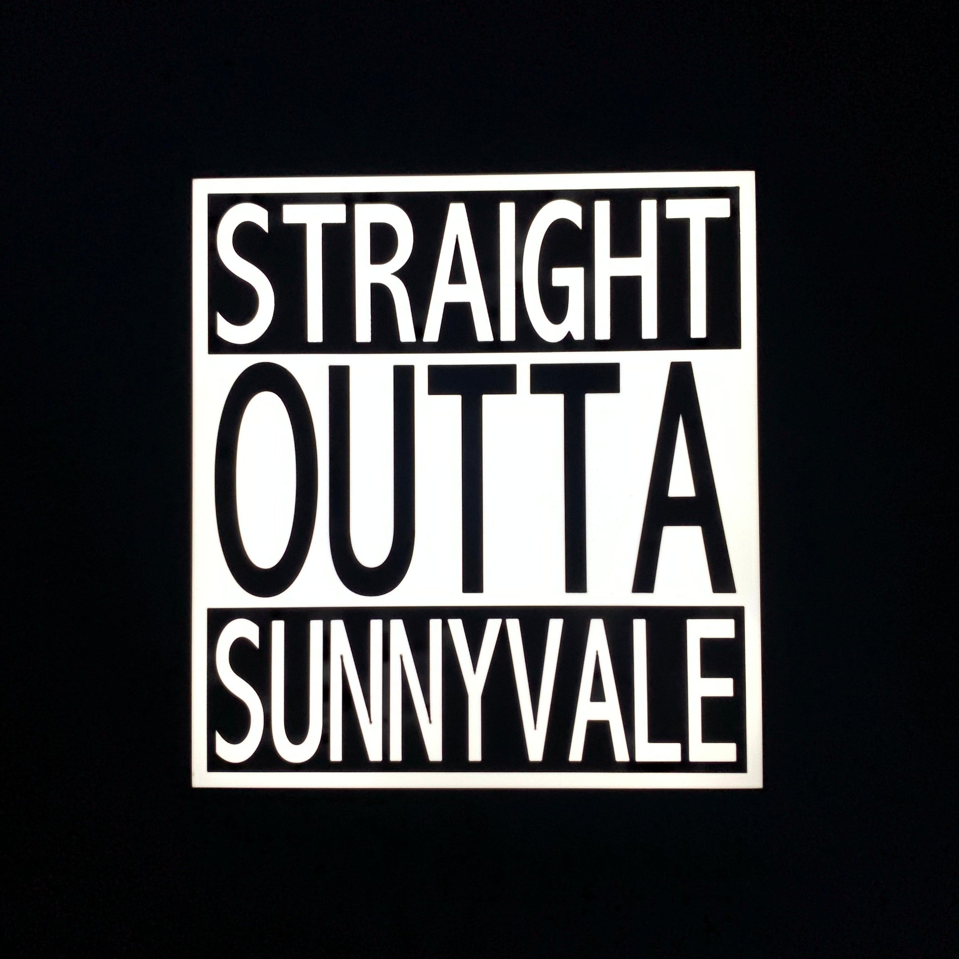 Text 'STRAIGHT OUTTA A SUNNYVALE' on a led indoor sign with a black background